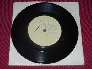 Kim Carnes:  Divided Hearts    7"  EX+     White label