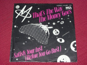 M:  That's The Way The Money Goes  GERMAN  7"  NEAR MINT VINYL  EX SHOP STOCK