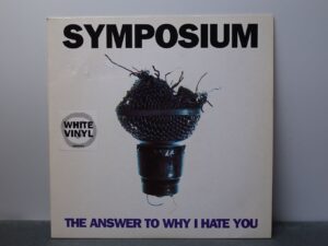 Symposium:  The Answer To Why I Hate You,   UK  EX+  White Vinyl   7"