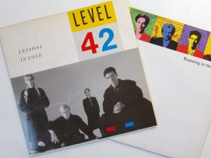 Level 42: 2 Original  EX  7"s ( Lessons in Love / Running in the Family)